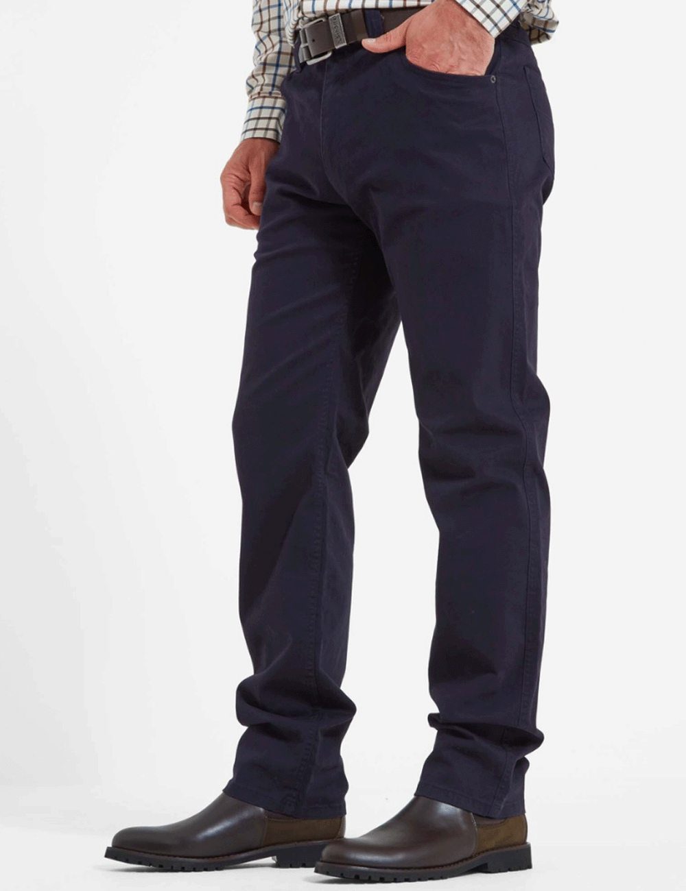 Man wearing the Canterbury Jeans with his hand in the left pocket