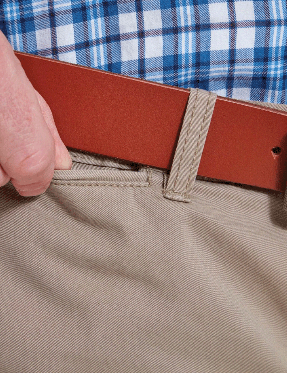 Man wearing the Christopher Chino holding the coin pocket with his right hand