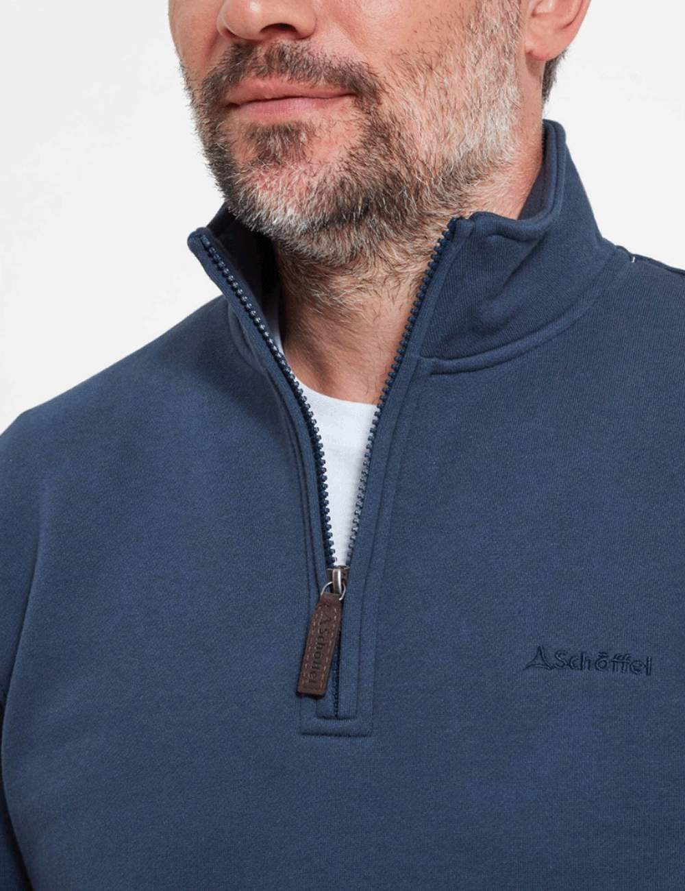 Close up at the neckline of man wearing the St. Merryn Sweatshirt