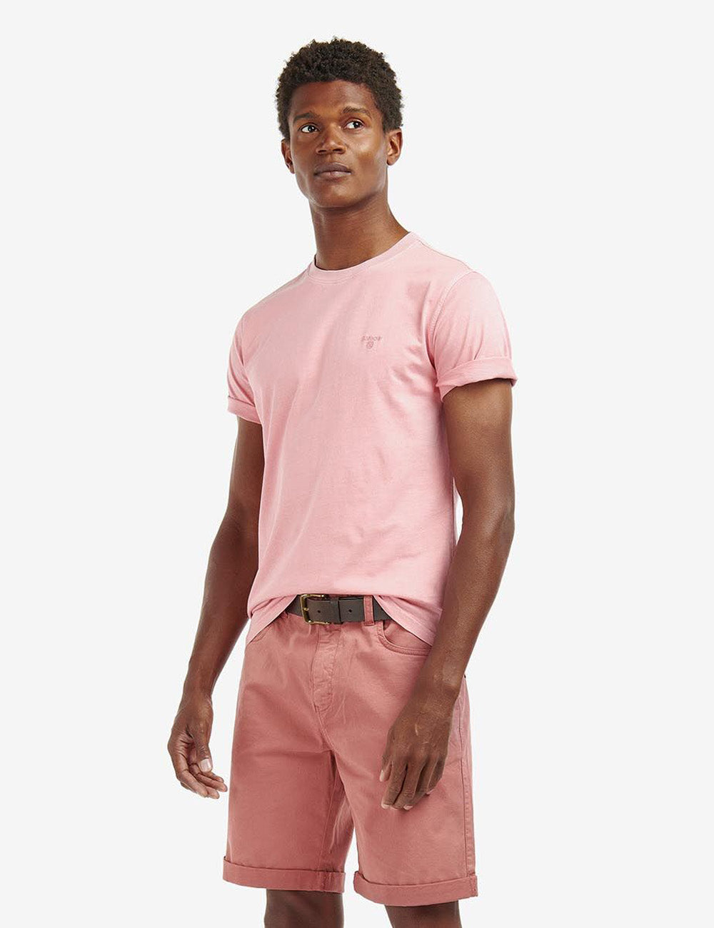 Man wearing the Barbour Garment Dyed T-shirt in Pink Salt