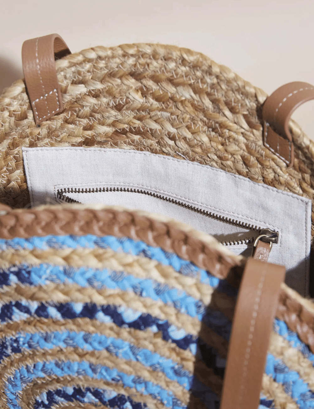 Close up of the internal pocket on the Eleanor Jute Circular Tote