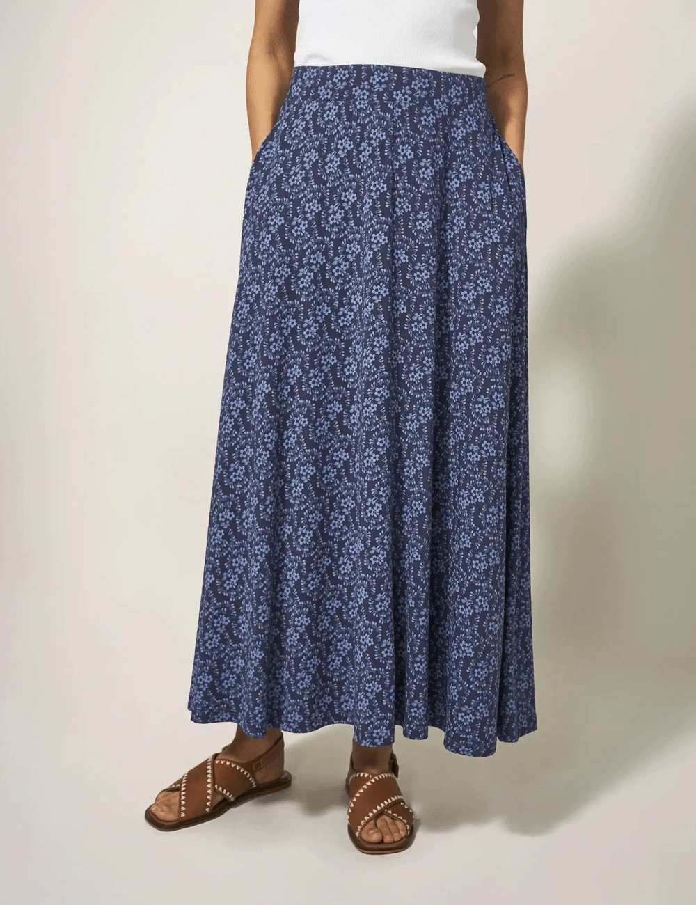 Woman wearing the Jada Maxi Skirt with her hands in the pockets