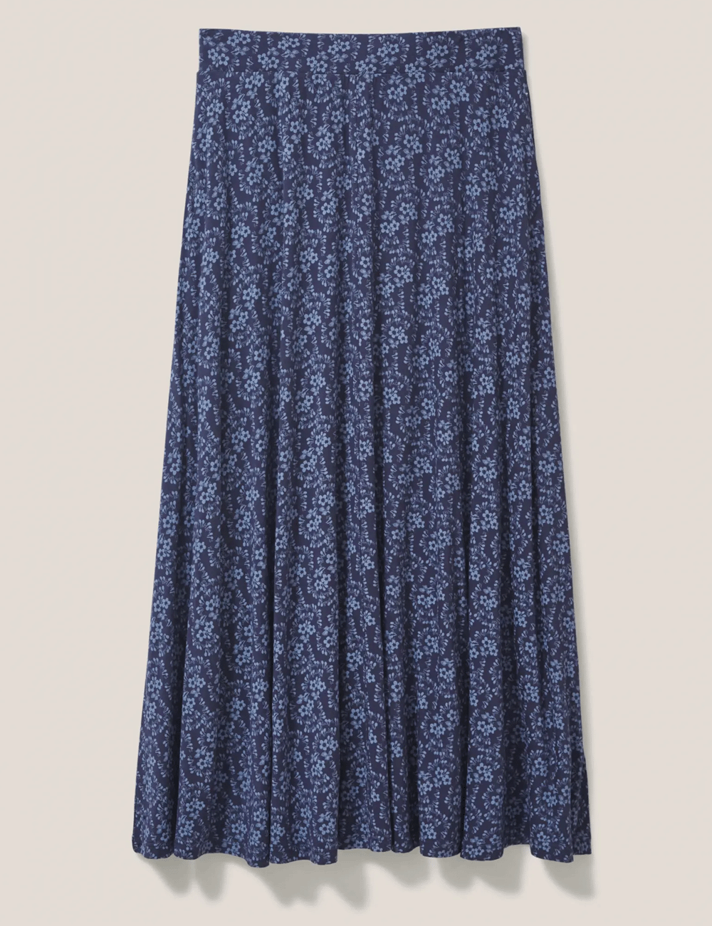 White Stuff's Jada Maxi Skirt in Navy Print on a grey background