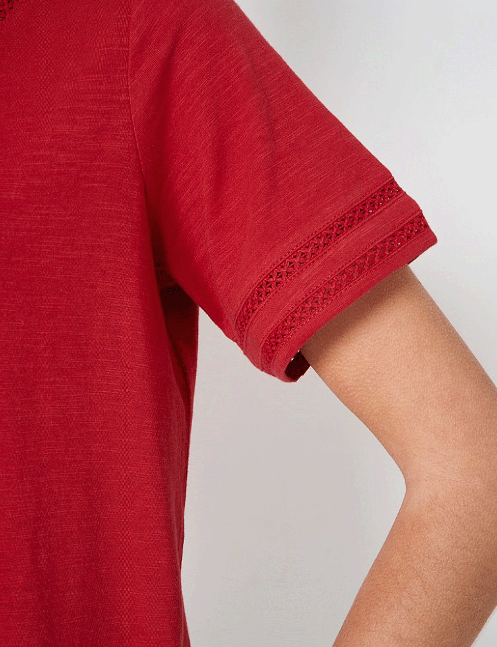 Close up of lace detailing on the left sleeve of the Lavendar T-Shirt