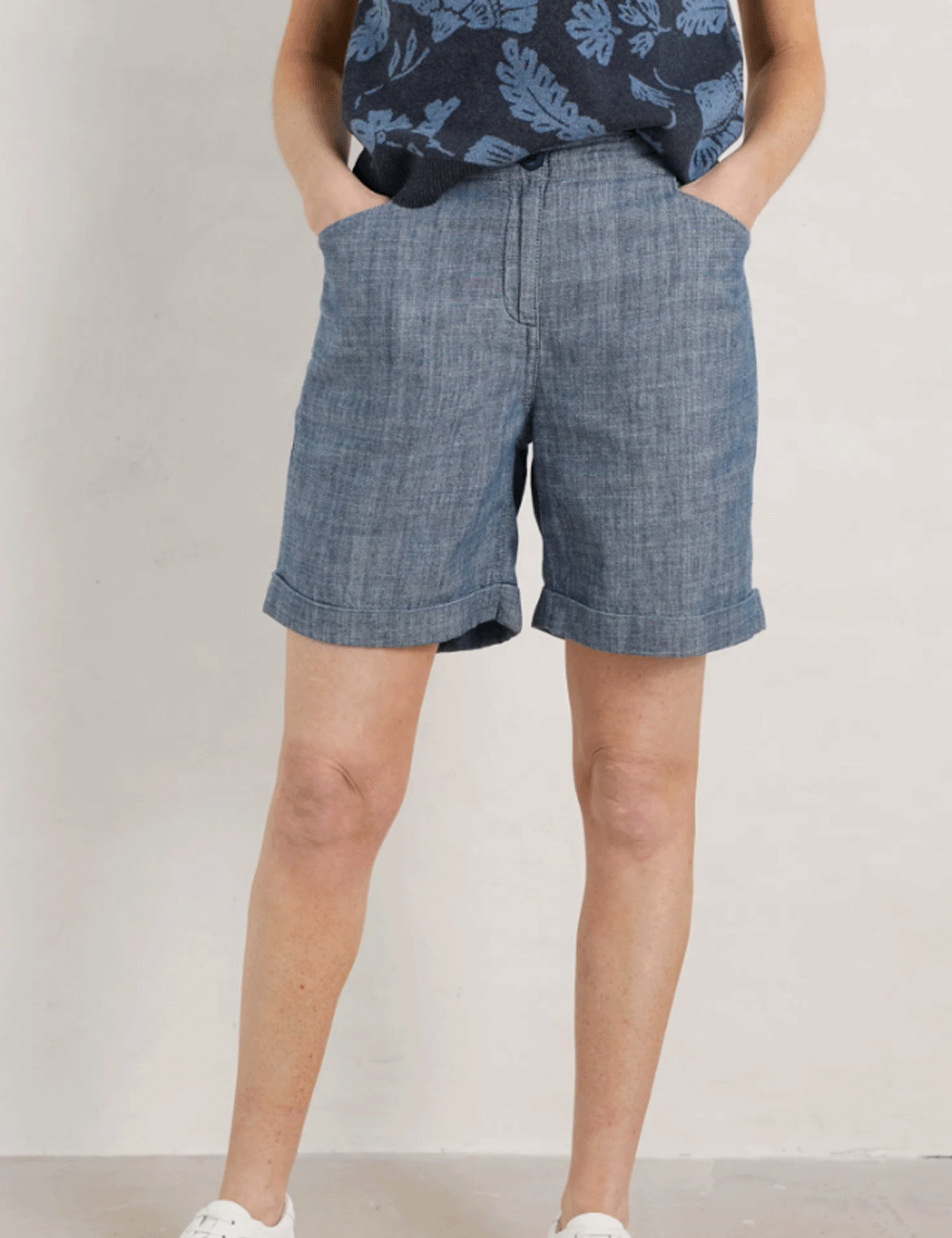 Woman wearing the Seasalt Penderleith Shorts with her hands in the side pockets