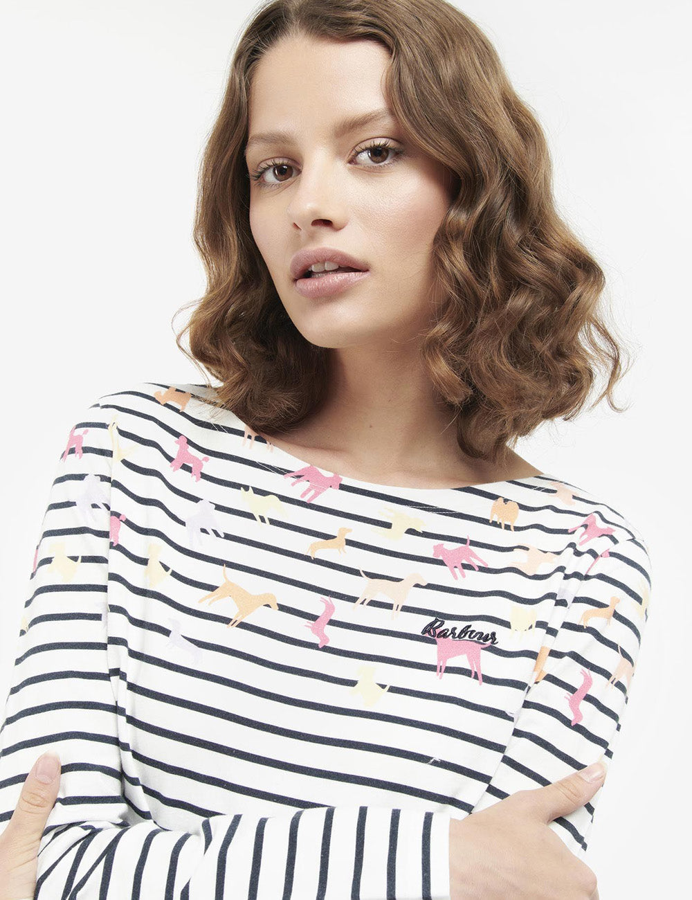 Close up of woman wearing the Bradley Top, focusing on the dog print