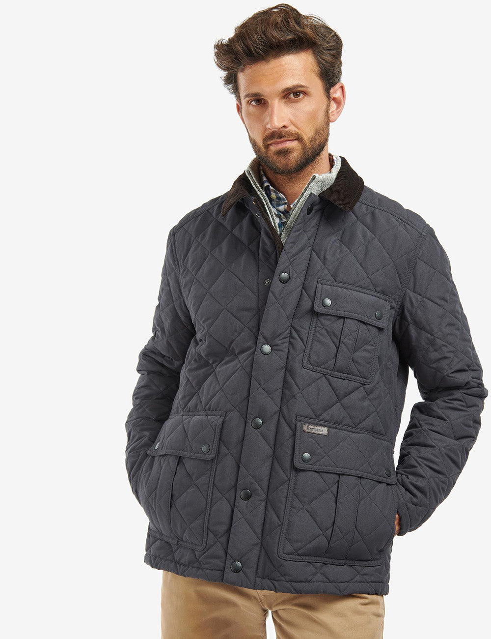 Man wearing the Horsley Quilted Jacket in Navy from Barbour