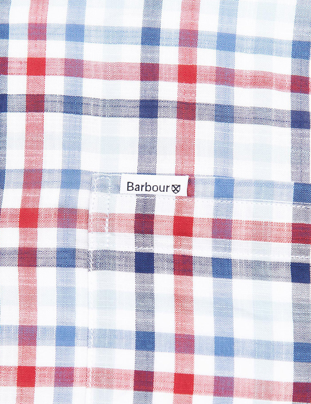 Close up of the chest patch pocket and Barbour branded label on the Kinson Shirt