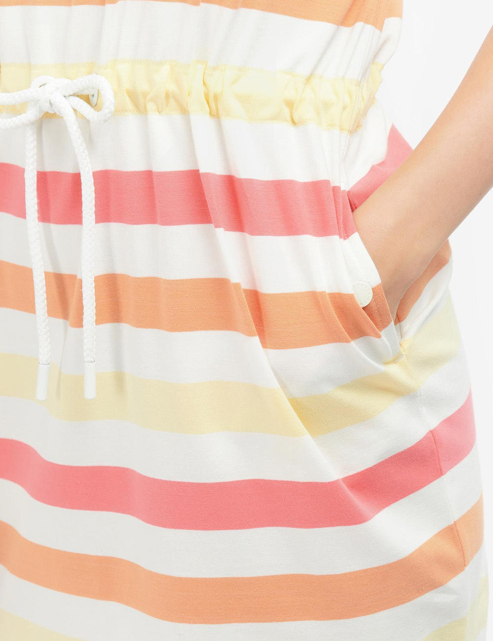 Close up of woman wearing the Marloes Dress with her hand in the left side pocket