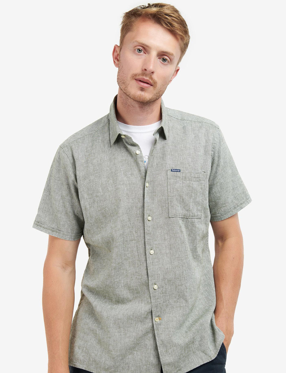 Man wearing the Barbour Nelson Shirt Sleeve Shirt in Bleached Olive