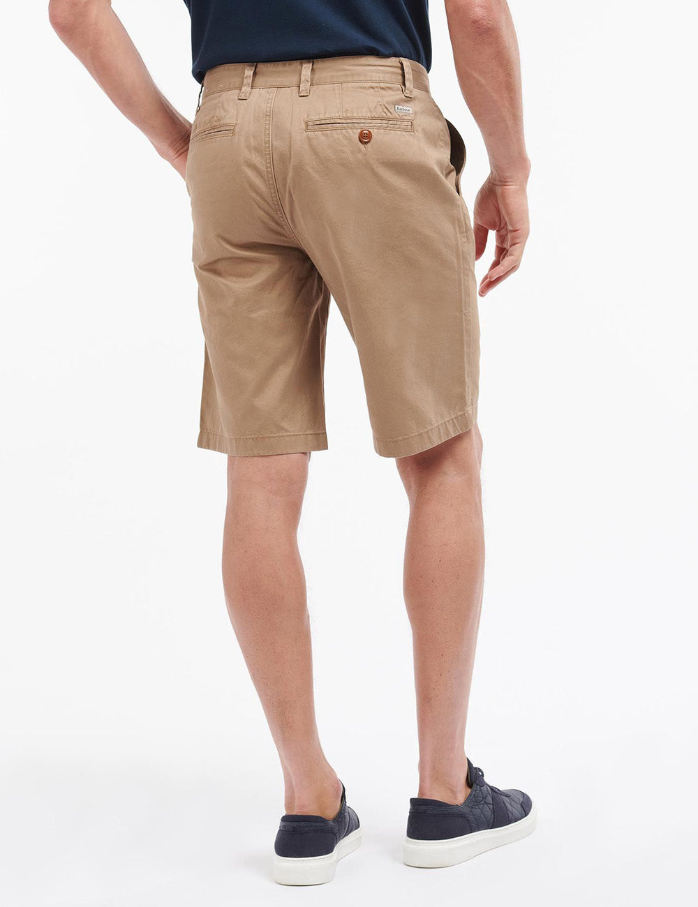 Image of man wearing the Neuston Shorts from the back
