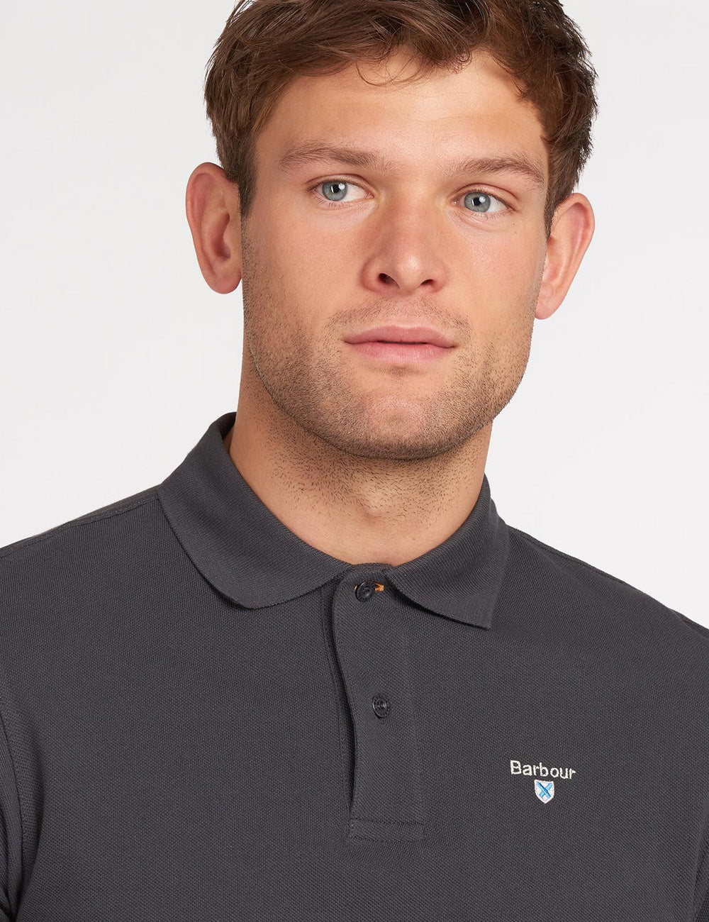 Close up of man wearing the Sports Polo with the buttons fastened