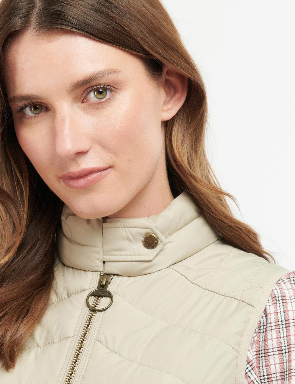 Close up of woman wearing the Gilet, focusing on the neckline
